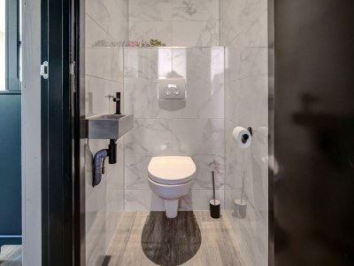 Holiday house Modern holiday home on Dutch coast with garden - Features photo 31