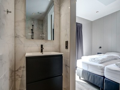 Holiday house Modern holiday home on Dutch coast with garden - Features photo 33