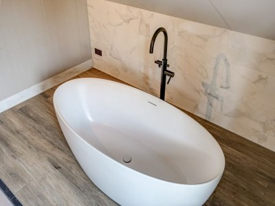 Holiday house Modern holiday home on Dutch coast with garden - Features photo 35