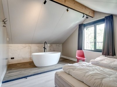 Holiday house Modern holiday home on Dutch coast with garden - Features photo 36