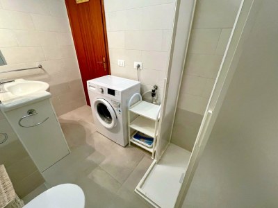 Apartment 5-Person Stay by the Beach - Features photo 10