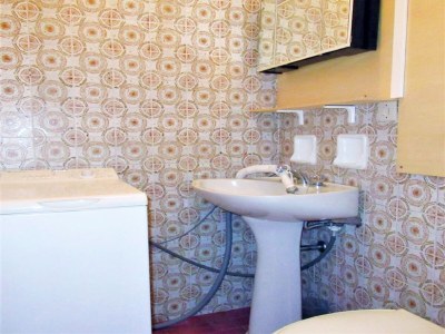 Apartment Holiday Home in Caorle near Beach - Features photo 9