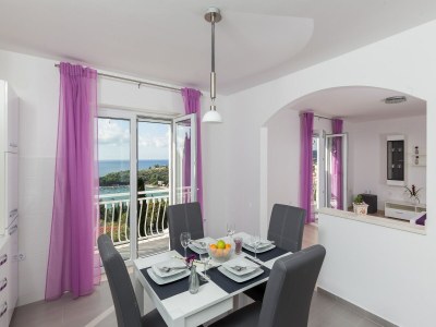 Apartment Apartments Villa Enzian - Comfort Two Bedroom Apartment with Balcony and Sea View - Features photo 8