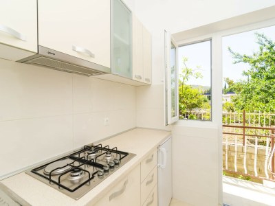 Apartment Apartments & Rooms Barišić - Standard Studio Apartment with Balcony and Garden View (G1-6) - Features photo 12