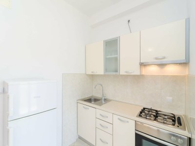 Apartment Apartments & Rooms Barišić - Studio Apartment with Balcony and Garden View (First Floor)-APT 9 - Features photo 11