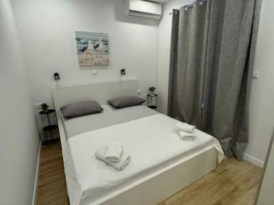 Apartment Apartment & Rooms Papa - Two Bedroom Apartment with Balcony and Partial Sea View - Features photo 15