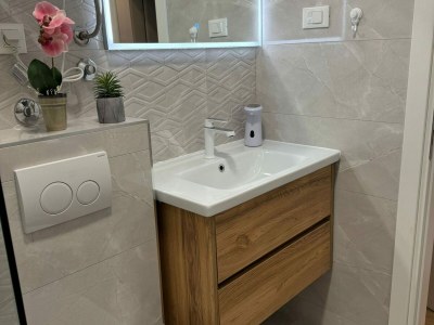 Apartment Apartment & Rooms Papa - Two Bedroom Apartment with Balcony and Partial Sea View - Features photo 19