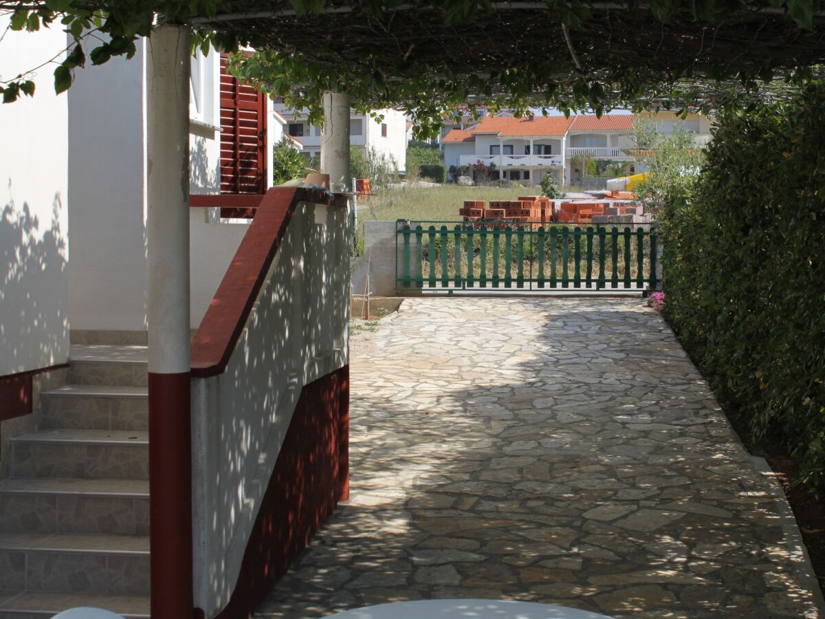 Apartment Two bedroom apartment with terrace Povljana, Pag A-6468-b