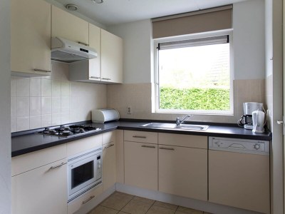 Holiday house Charming forest house surrounded by a garden - Features photo 5