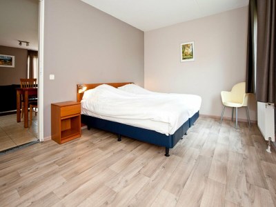 Holiday house Charming forest house surrounded by a garden - Features photo 6