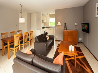 Holiday house Charming forest house surrounded by a garden - Features photo 7