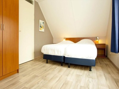 Holiday house Charming forest house surrounded by a garden - Features photo 9