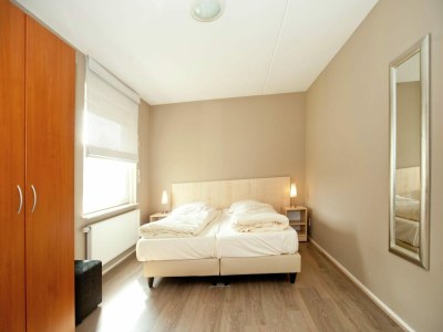 Holiday house Charming forest house surrounded by a garden - Features photo 10