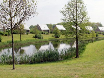 Holiday house Charming forest house surrounded by a garden - Environment photo 13