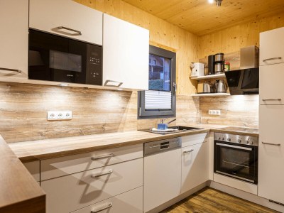 Chalet Superior Ferienhaus # 63 mit IR-Sauna & Whirlwanne - Features photo 8