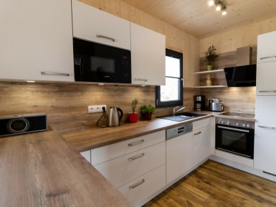 Chalet Superior Ferienhaus # 63 mit IR-Sauna & Whirlwanne - Features photo 12