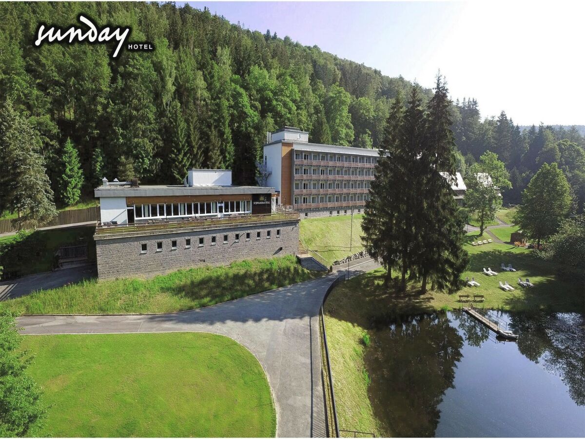 Apartment Schwarzbachtal Doppelzimmer mit Wald und Bergblick