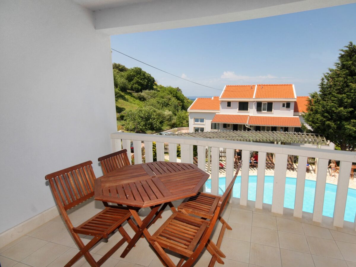 Apartment One bedroom apartment with terrace and sea view Kampor, Rab A-3214-d