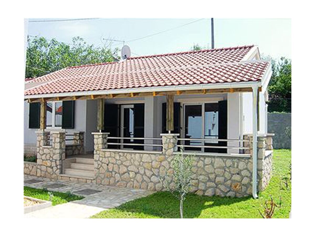 Holiday house Two bedroom house with terrace and sea view Kampor, Rab K-3216