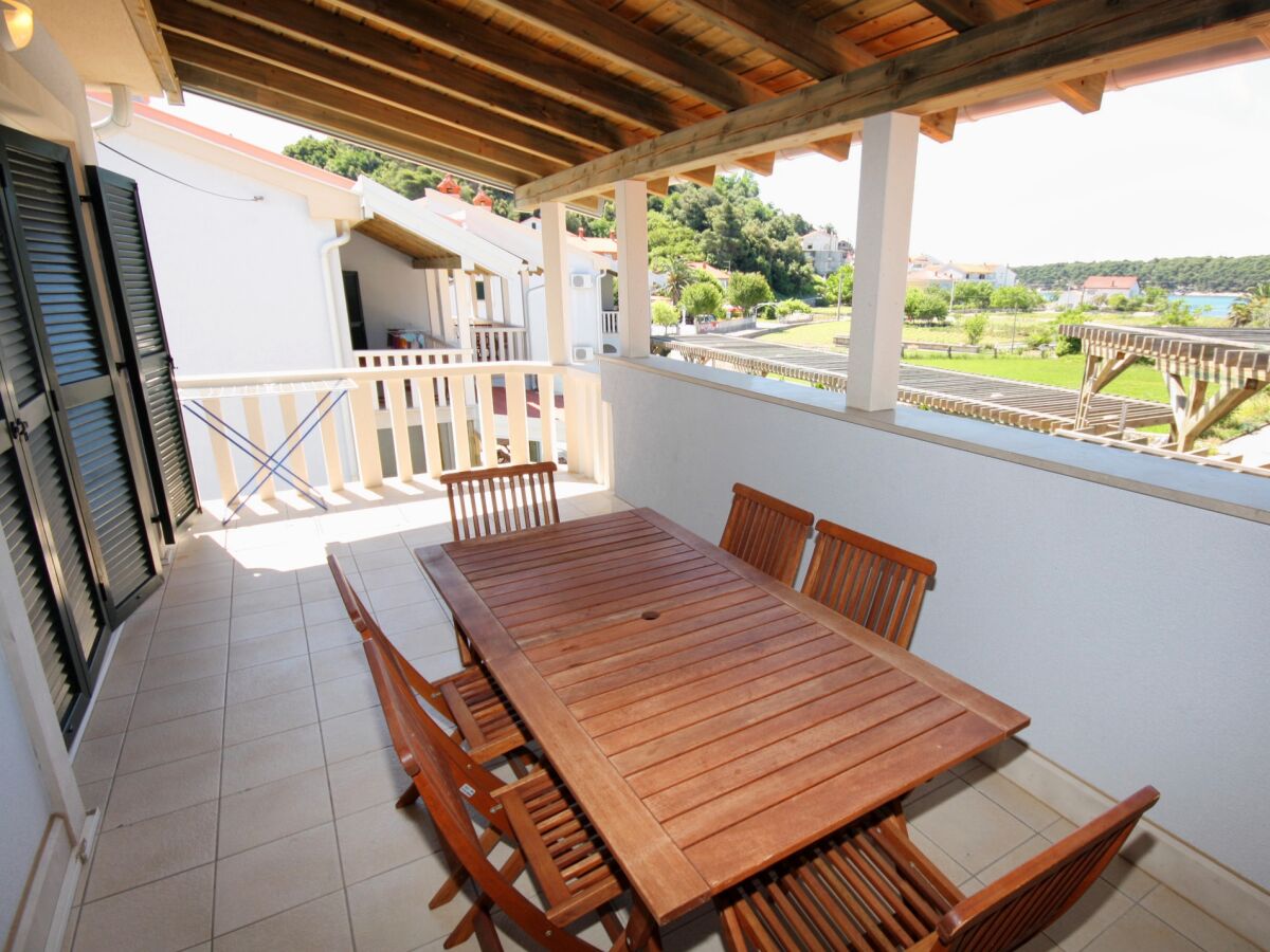 Apartment Two bedroom apartment with terrace and sea view Palit, Rab A-3212-c