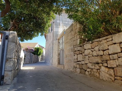 Apartment Three bedroom apartment with terrace Postira, Brač A-14822-a - Outdoor photo 4