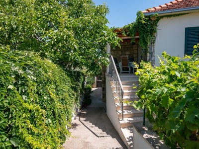 Apartment Three bedroom apartment with terrace Postira, Brač A-14822-a - Outdoor photo 5