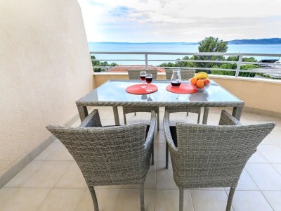 Apartment Two bedroom apartment with terrace and sea view Brela, Makarska A-19998-b in Brela - Apartment