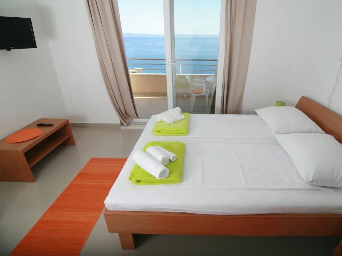 Apartment Studio flat with terrace and sea view Brela, Makarska AS-19998-b