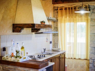 Holiday house Charming holiday home with garden - Features photo 12