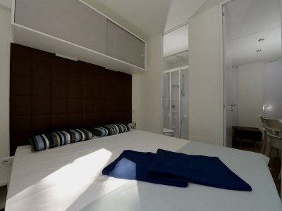 Holiday park Chalet in Baia Domizia mit Privatstrand - Features photo 6