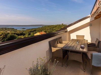 Apartment Two bedroom apartment with terrace and sea view Sveti Jakov, Lošinj A-24153-a - Outdoor photo 15