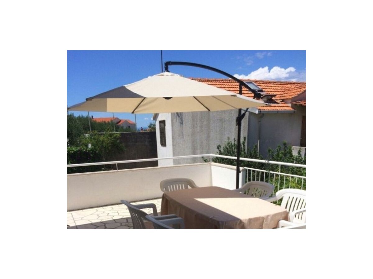 Apartment Two bedroom apartment with terrace and sea view Postira, Brač A-17323-d - Outdoor photo 5