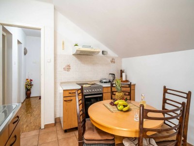 Apartment Apartments & Rooms Mara & Petrunjela - One Bedroom Apartment with Balcony and Sea View - Features photo 16