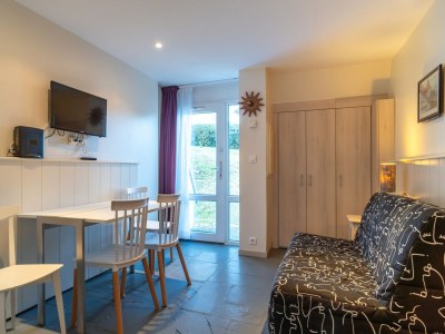 Apartment Ferienwohnung an der Küste mit beheiztem Pool - Features photo 6