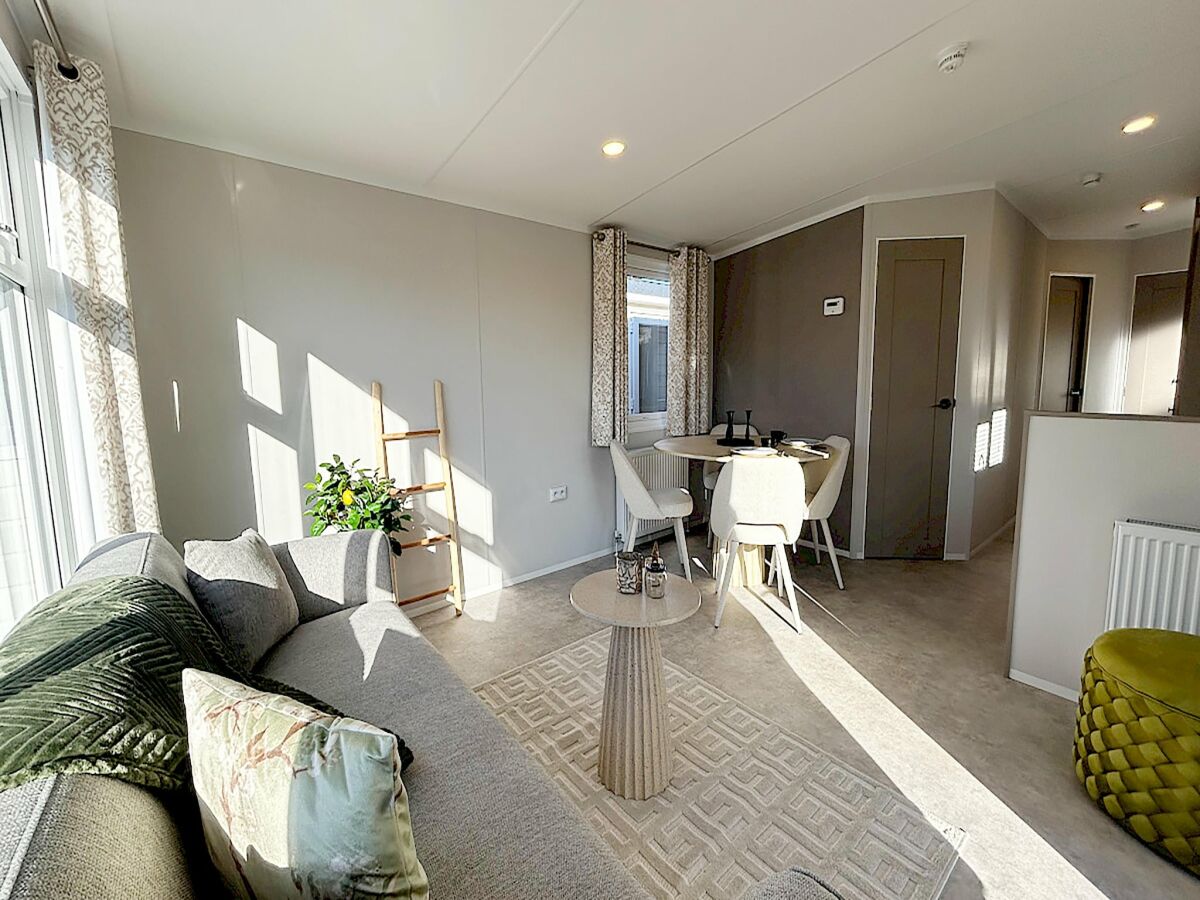 Chalet Inviting Hollum Chalet near Golf Course - Features photo 3