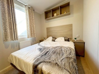 Chalet Inviting Hollum Chalet near Golf Course - Features photo 4