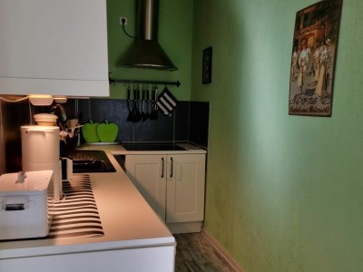 Holiday apartment Ferienwohnung Kaptain´s Kombüse - Features photo 13