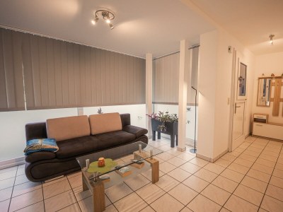 Apartment Ferienwohnung mit überdachtem Außenbereich - Features photo 14